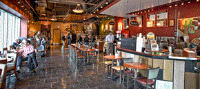 Jersey City apartment for rent - the interior of a restaurant with people sitting at tables